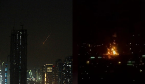 Fire near Dubai airport under control after drone attack, flights suspended